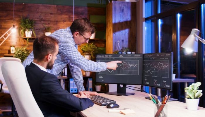 business-colleagues-discussing-together-office-night-teamwork-partnership (3)