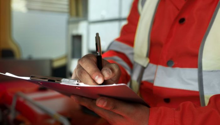 side-view-man-taking-notes-ambulance-car